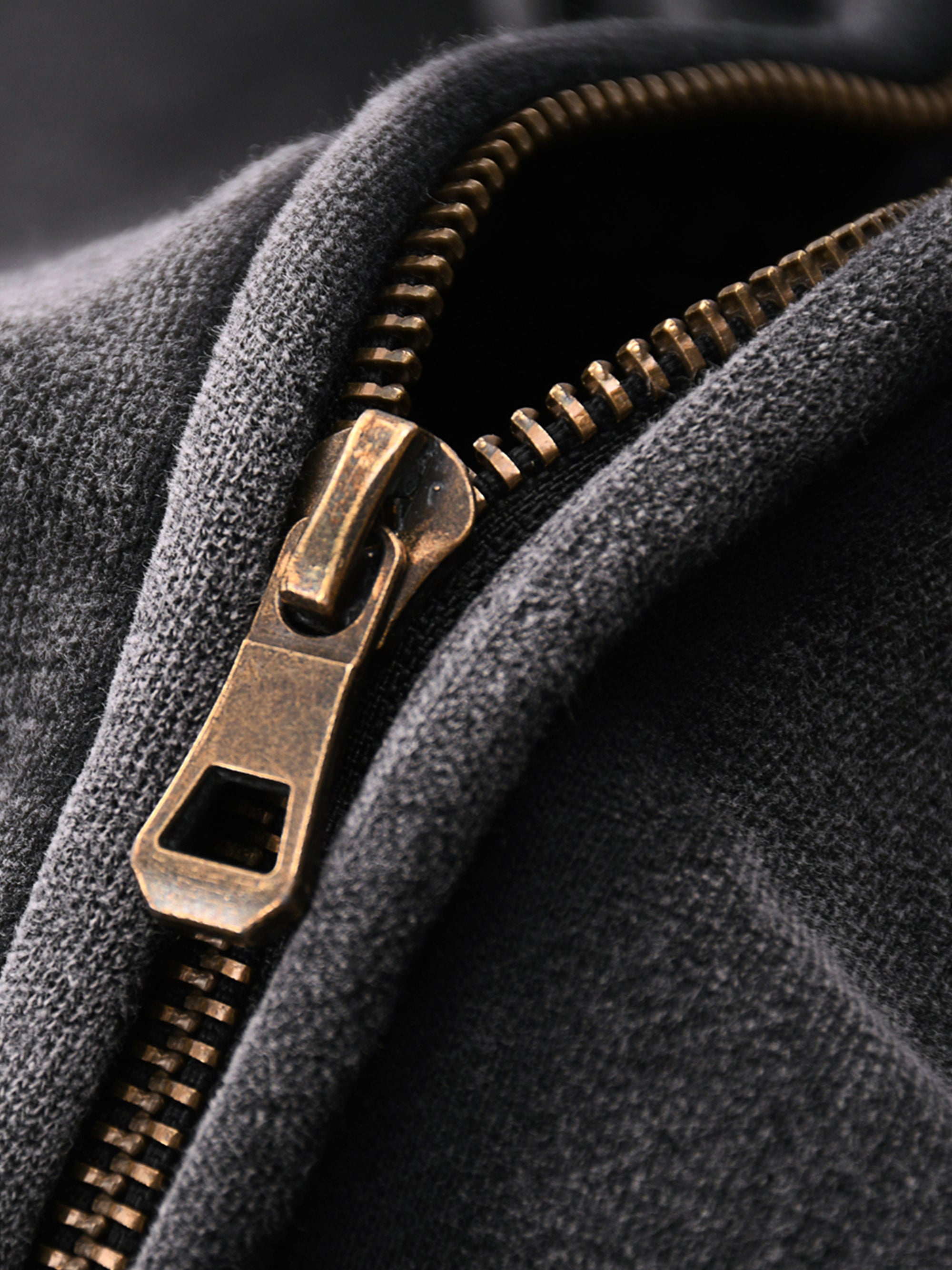 Close-up detail of Genzerz Boxy Zip-Up Hoodie zipper – vintage washed black