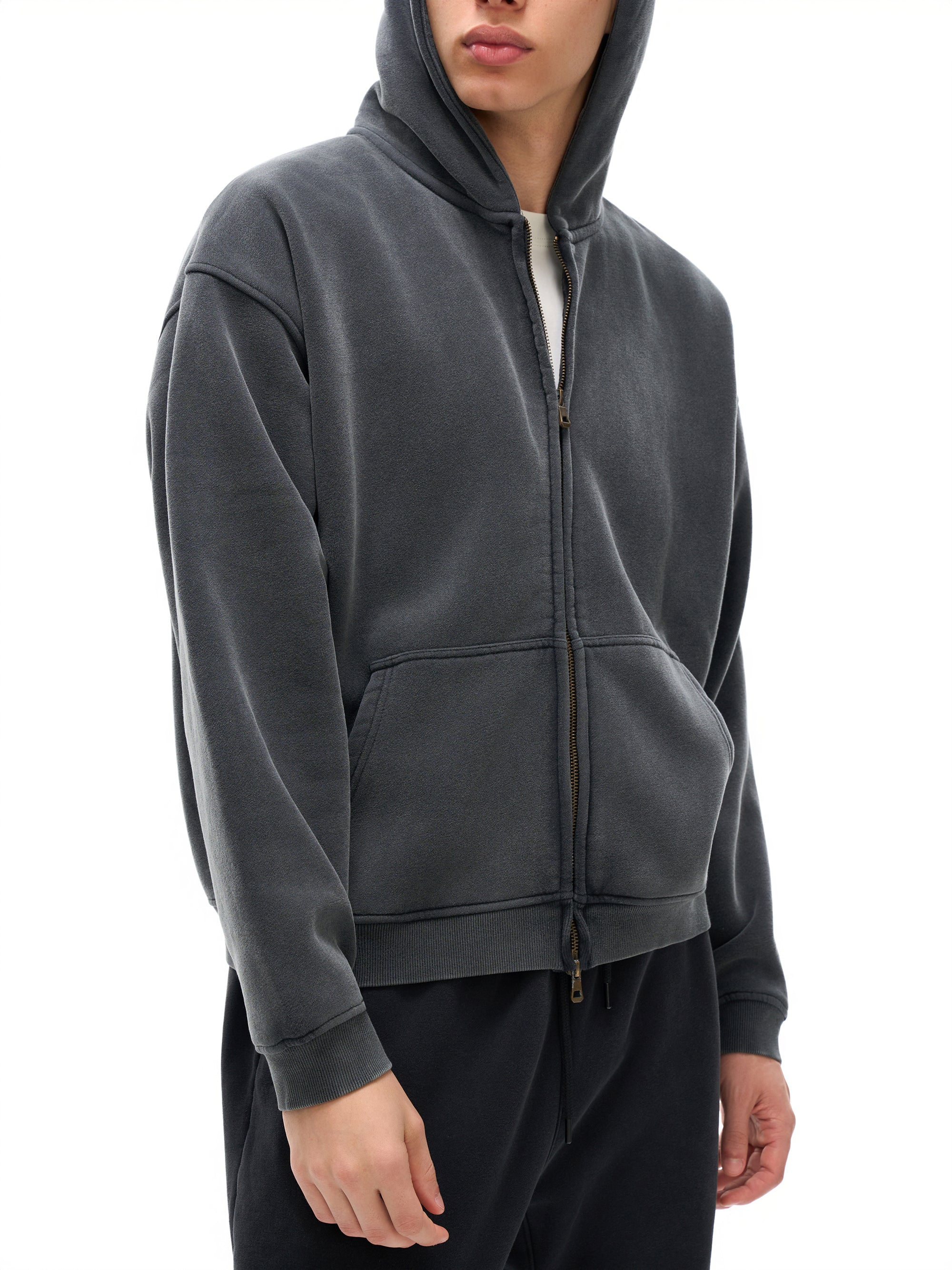 Model wearing Genzerz Boxy Zip-Up Hoodie – vintage washed black oversized hoodie